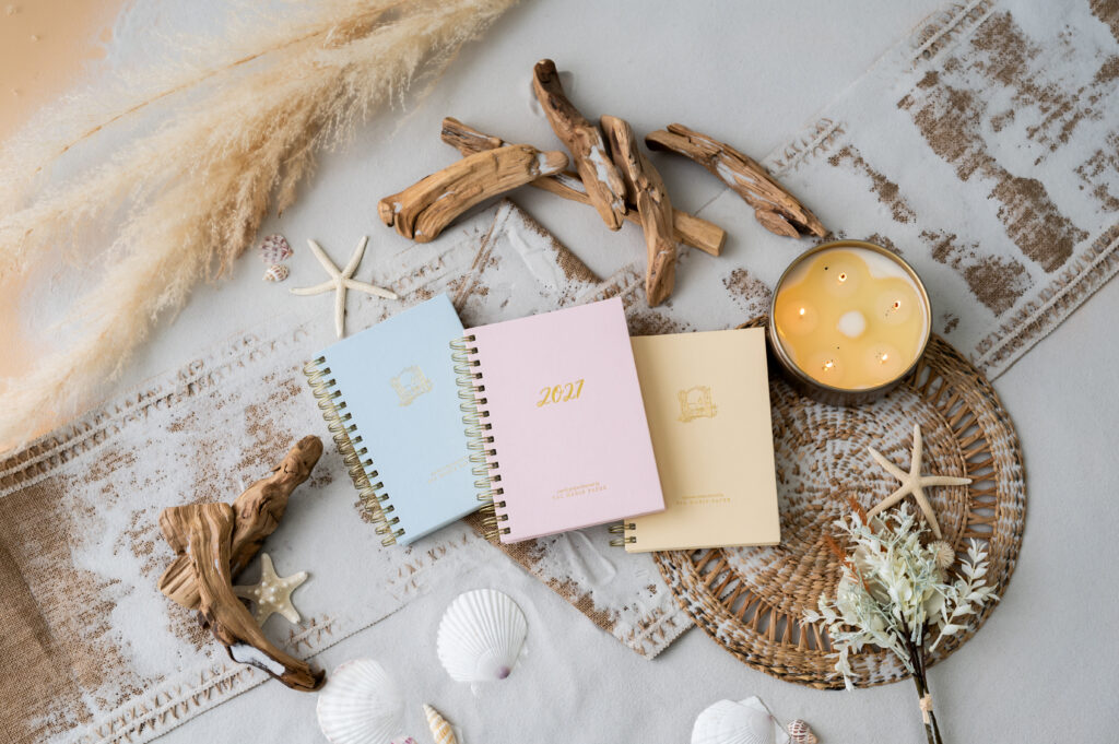 Signature prayer journals in sky and butter yellow, rhythms prayer journal in rosewater